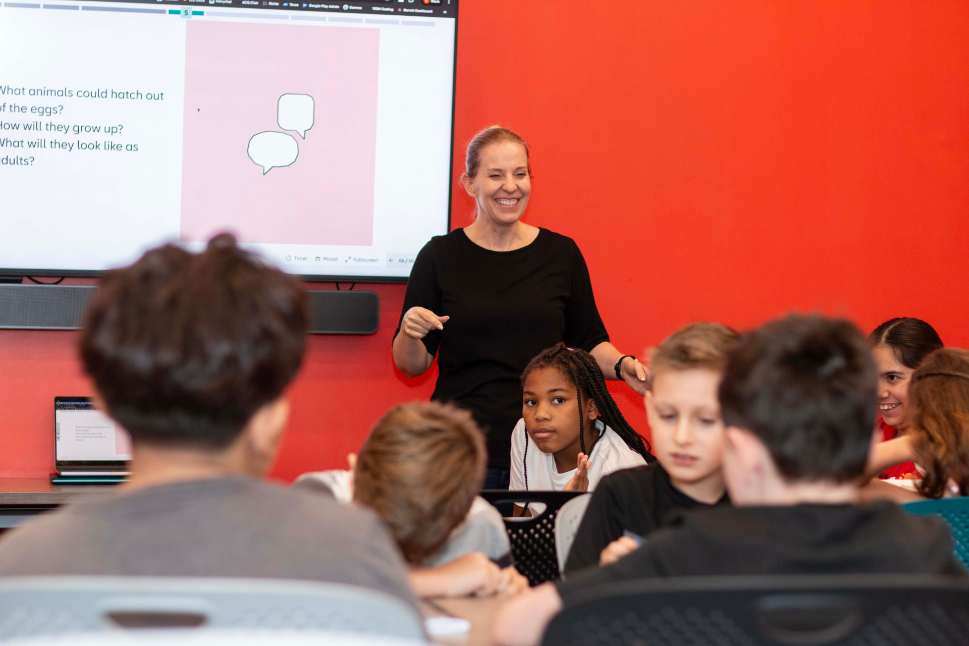 Teacher leading a LEGO Education science discussion with students