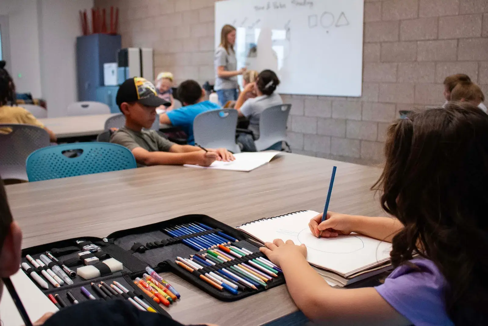 Kids working on projects in a Sanctuary class